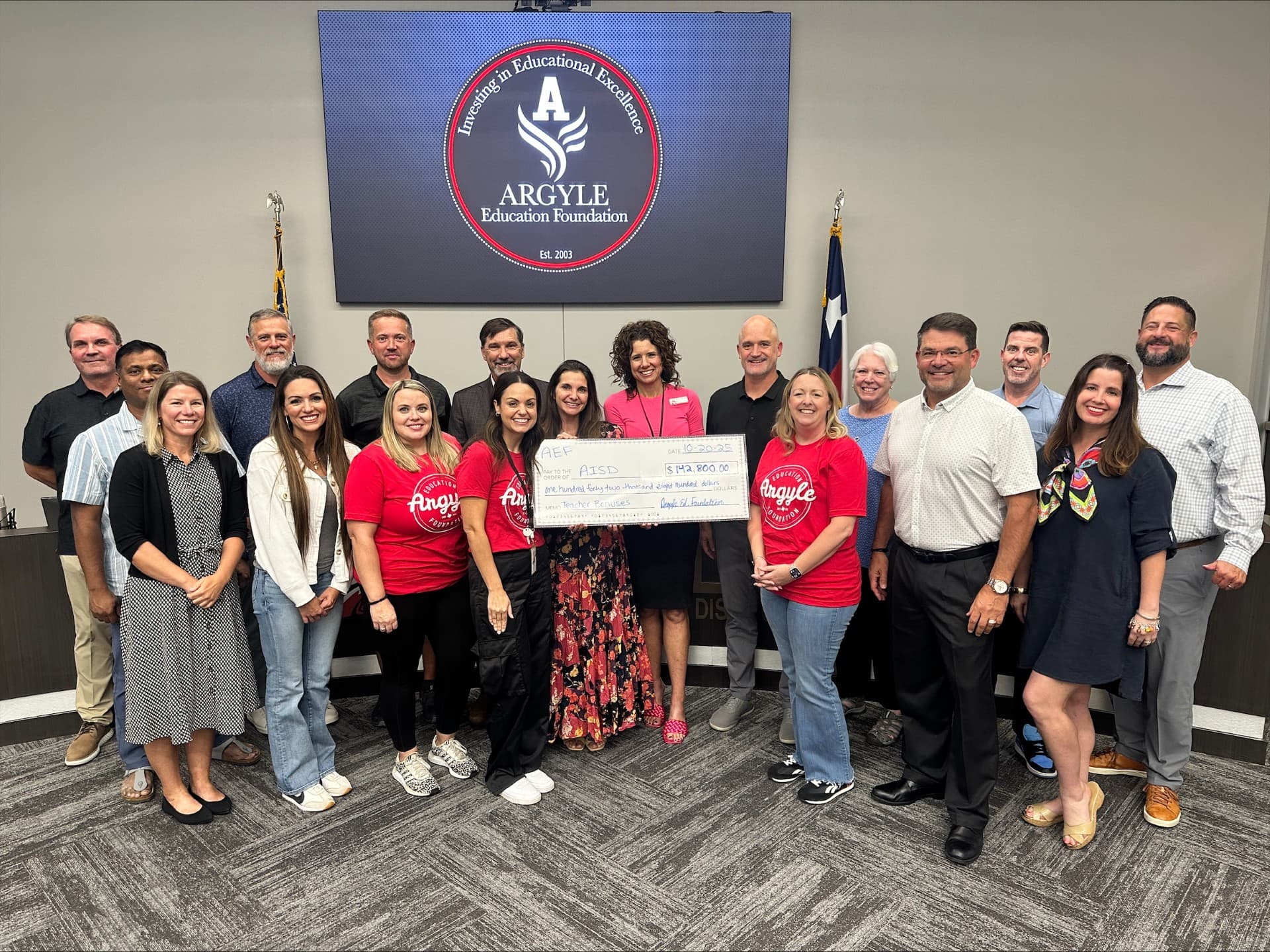 AEF presenting $142,800 check to Argyle ISD in October 2025